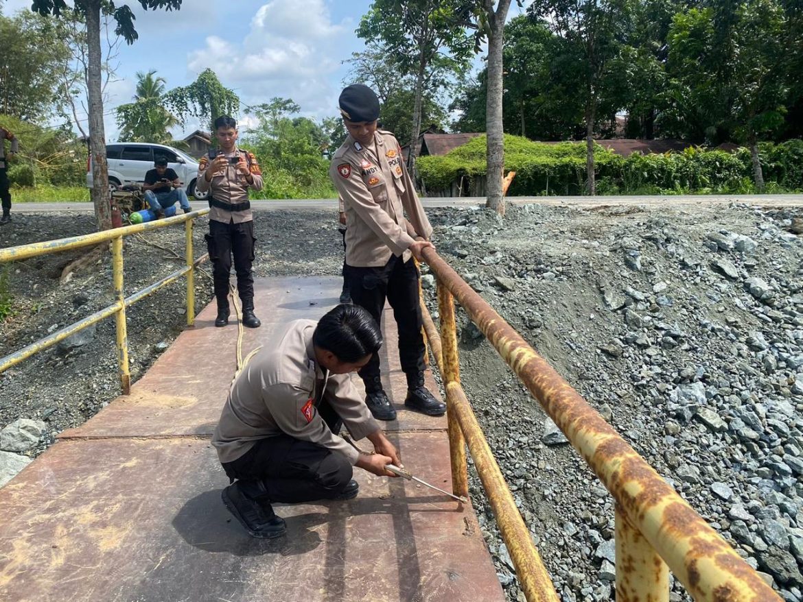 Polres Tanah Bumbu Dukung Pembangunan Jembatan di Kelurahan Tungkaran Pangeran Kecamatan Simpang Empat